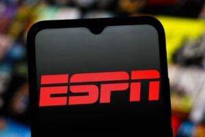 ESPN app logo displayed on a smartphone screen, representing the official app for watching live sports, news, and sports content on your mobile phone.